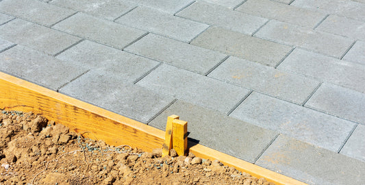how long until sealing new pavers